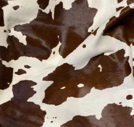 Brown Cow Print Stencil Over Off-White Cowhide